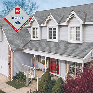 House with gray GAF timberline shingles and the GAF Certified Residential Roofing Contractor logo on the top left