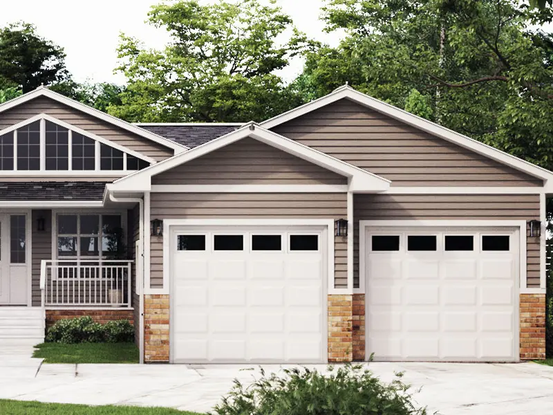 Home with light brown steel siding
